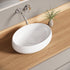 Bazyths Vessel Sink Bathroom Sink Restroom Sink Oval Washbasin Above Counter White Porcelain Ceramic Modern Vanity Sink Art Basin Sink for Bathrooms Café Restaurant Washroom 19.1"L x 13.4"W x 5.7"H